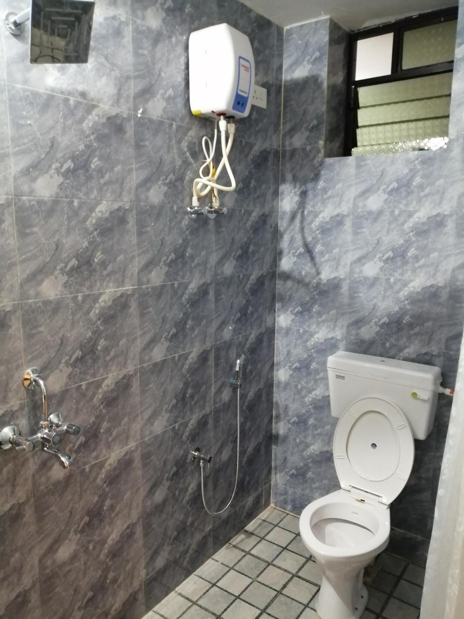 Apricot Homestays بالوليم الغرفة الصورة